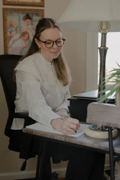 Emily Taking Notes - Everwell Counselling & Wellness